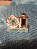 CHAMPIONS MANCHESTER CITY TROPHY AND RETRO CREST MCFC PIN